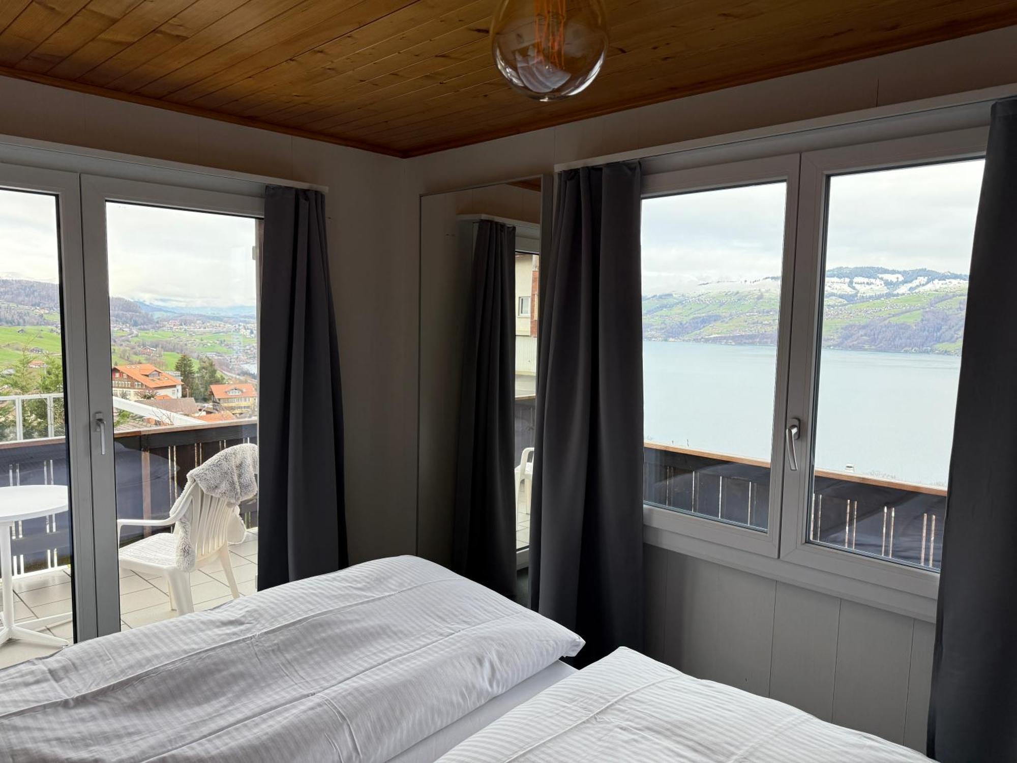 Eva'S Seeblick Krattigen Chambre photo