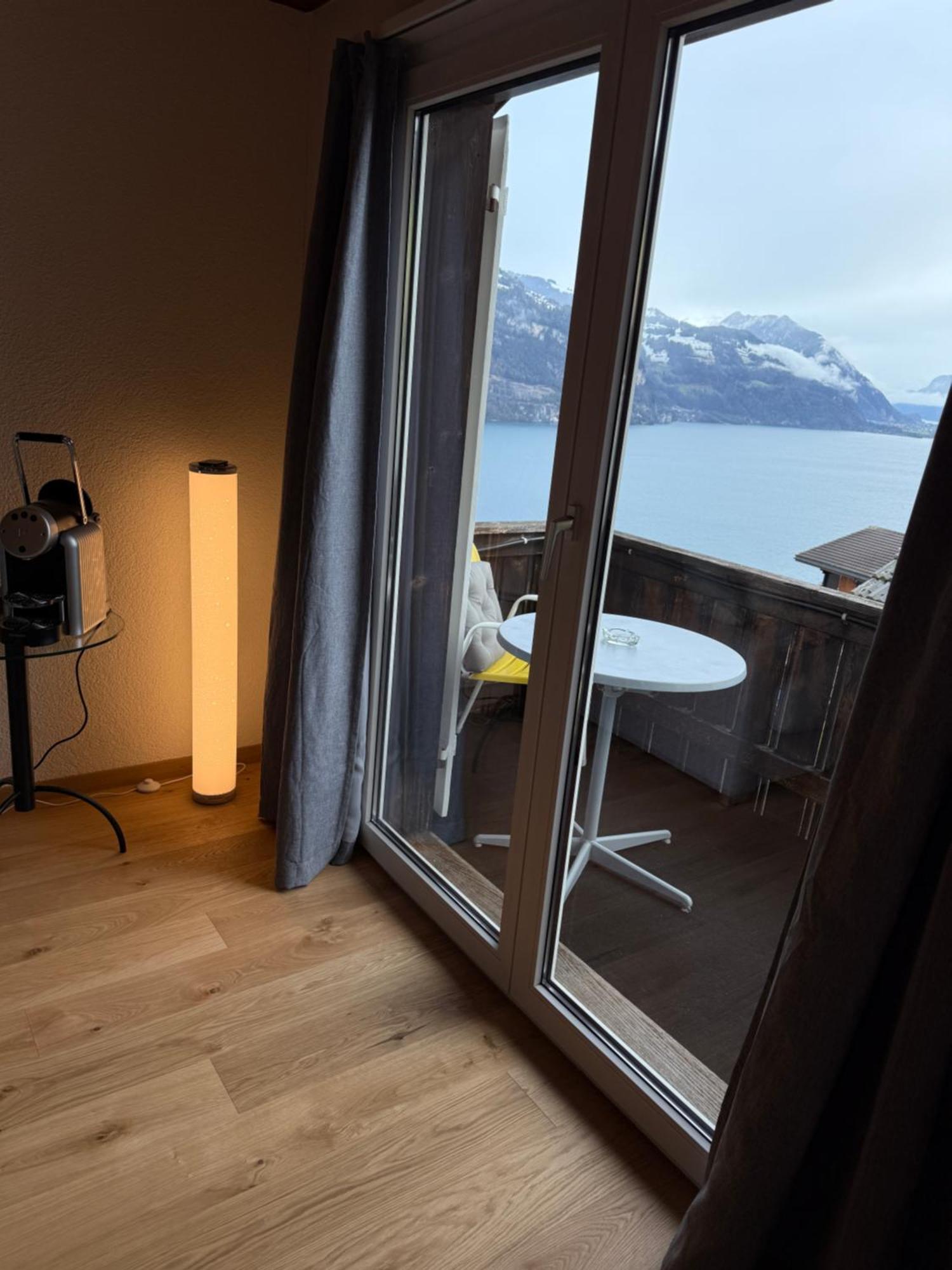 Eva'S Seeblick Krattigen Chambre photo