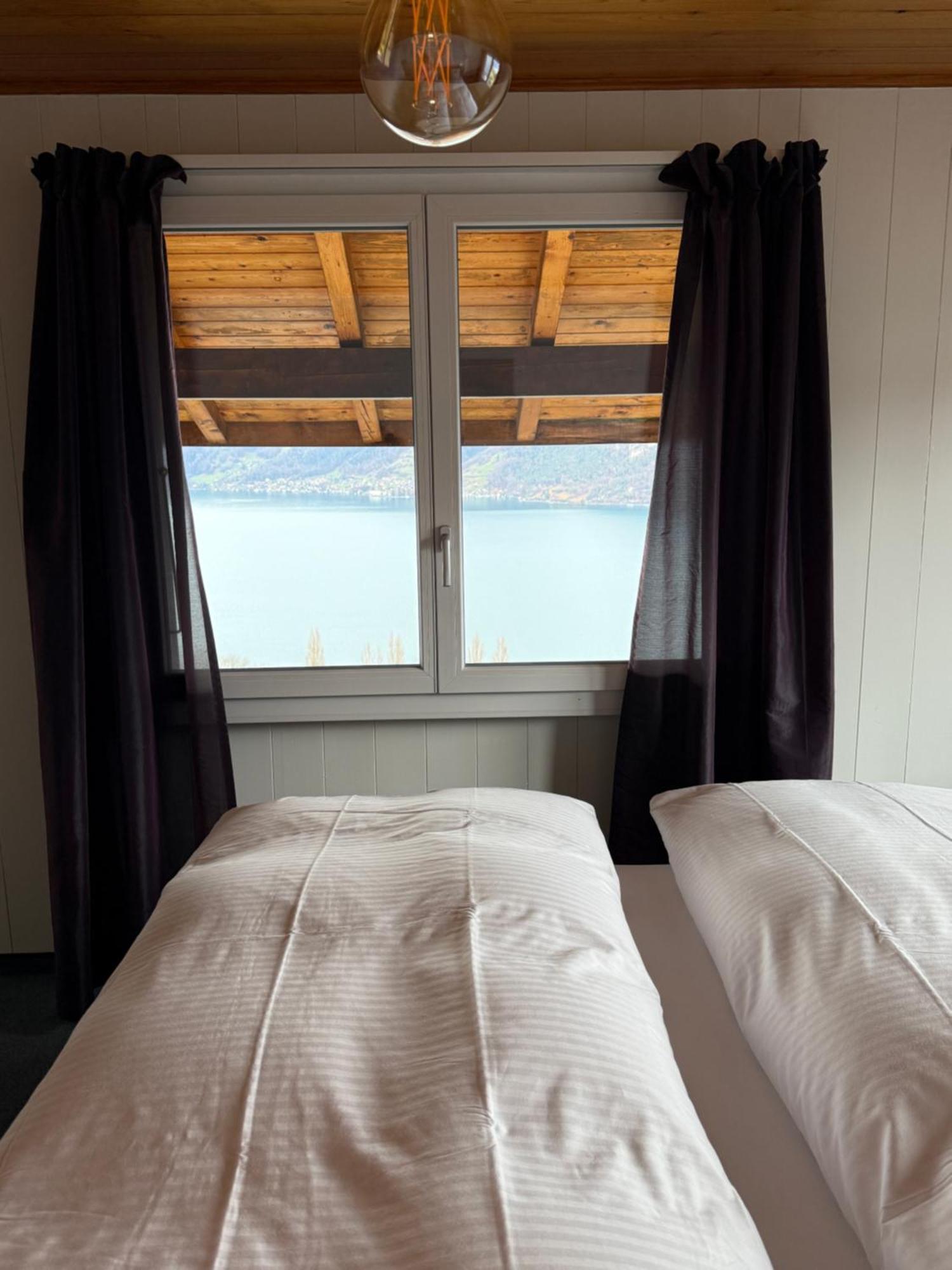 Eva'S Seeblick Krattigen Chambre photo