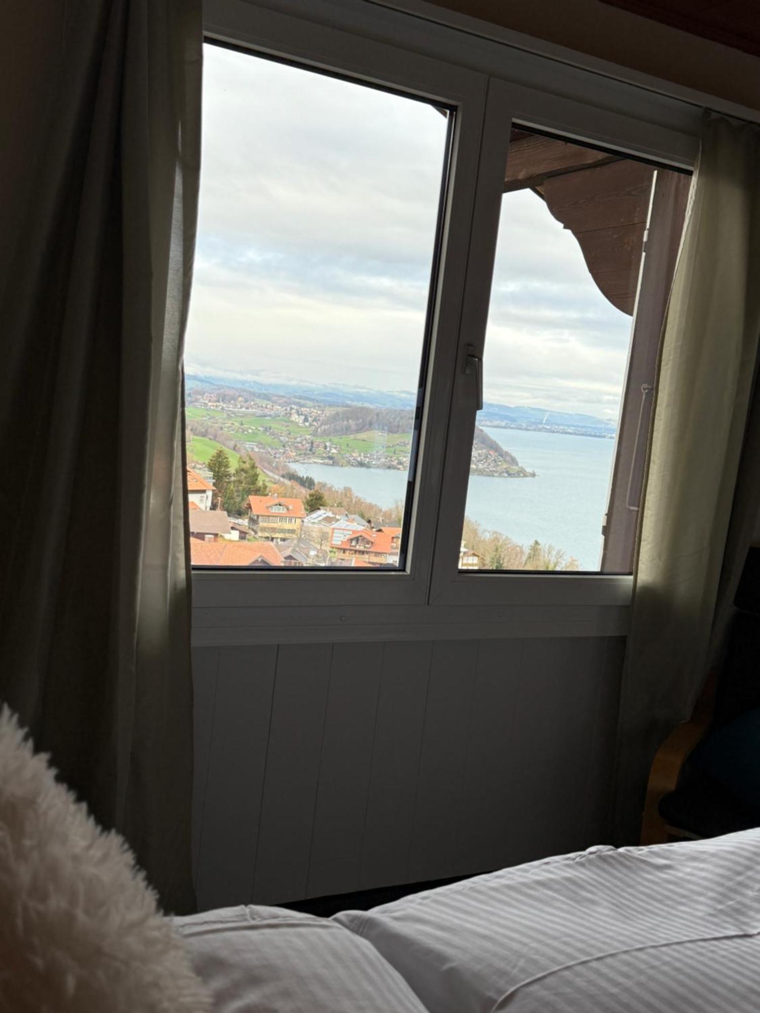 Eva'S Seeblick Krattigen Chambre photo